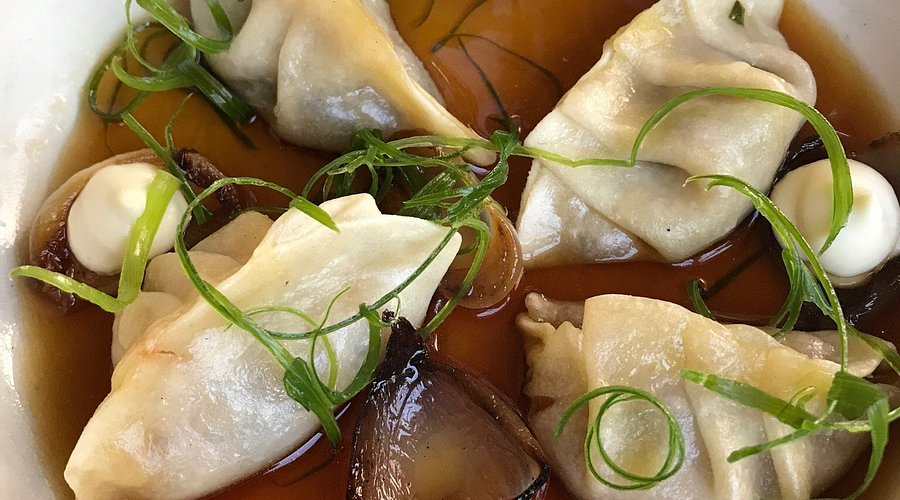 Harbinger signature dishes  Menu changes frequently and is designed for sharing; known for creative vegetable preparations, dumplings, unique flavor pairings, and often a tasting menu option.