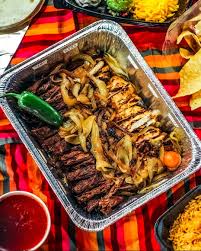 La Margarita Restaurante signature dishes Fajitas, Carne Asada, Shrimp Brochette, Top Shelf Guacamole
