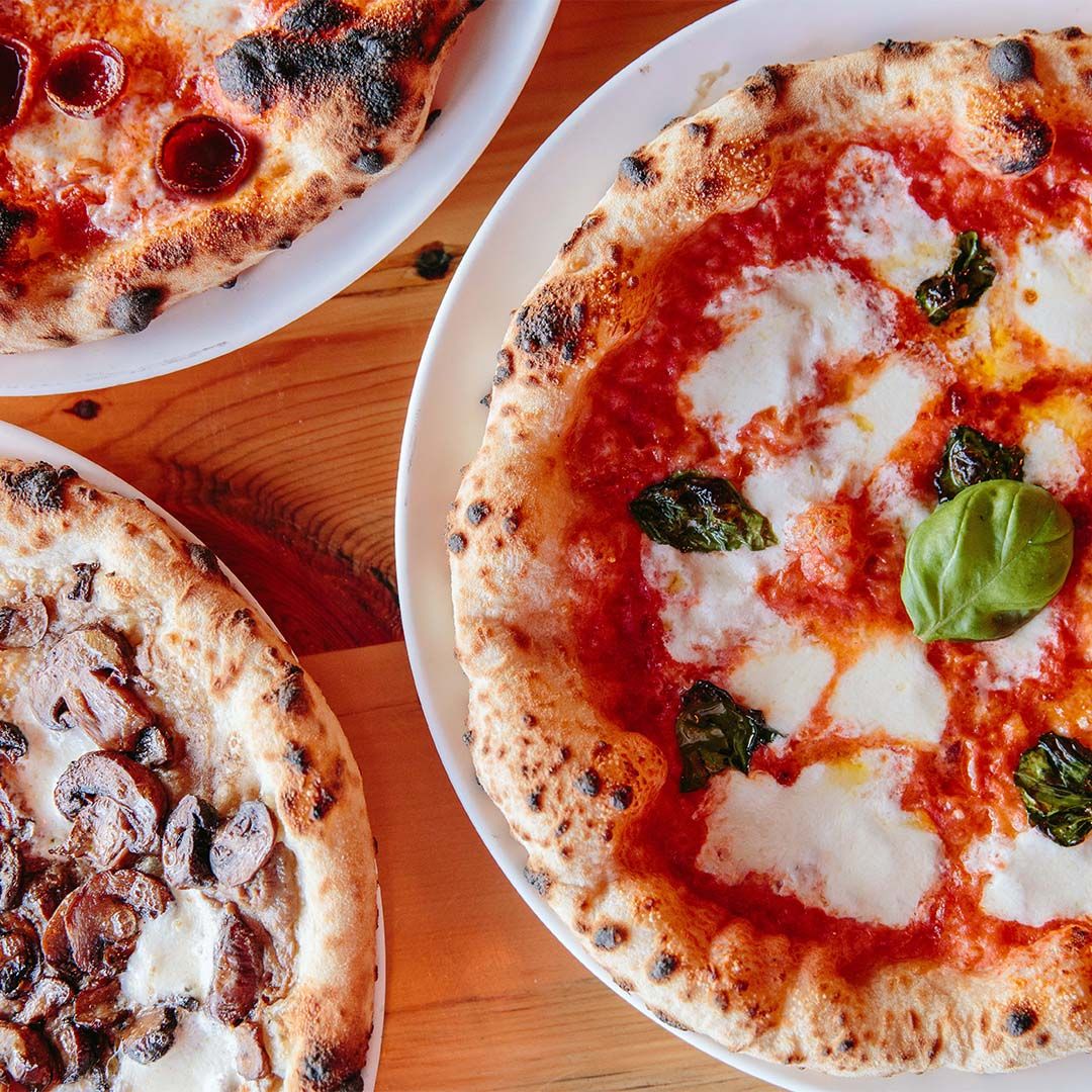 Amore by Wegmans signature dishes Neapolitan-style Pizza, House-made Pasta, Seafood Cioppino