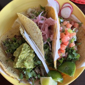 El Sur Street Food Co. signature dishes Baleadas (flour tortillas with beans, cheese, and other fillings), Con Todo, Gringas, house-made aqua frescas